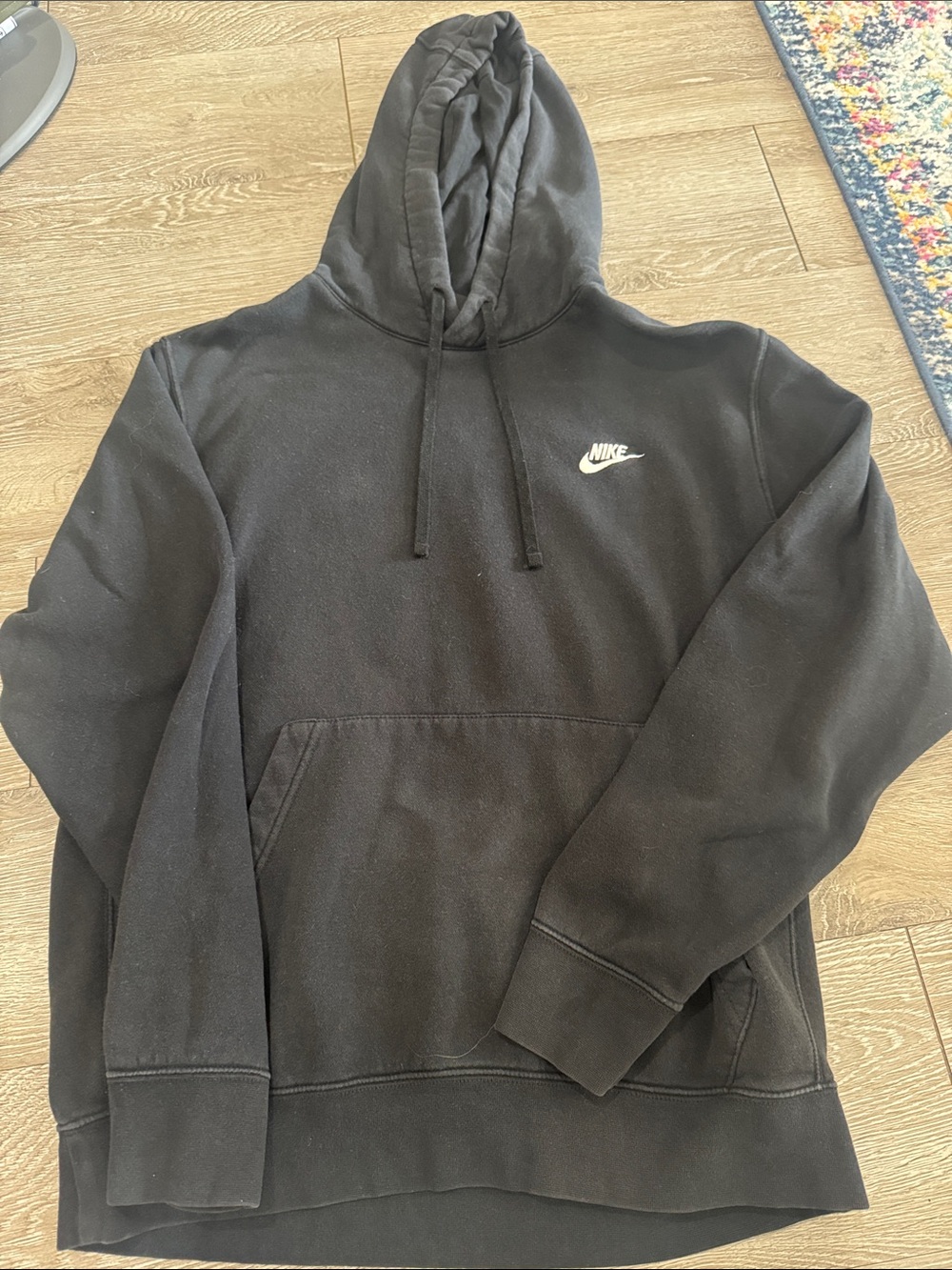 Nike Black Hoodie with White Swoosh Logo